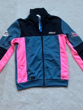 This is an extra RARE LIMITED EDITION DISNEY /ADIDAS Track Jacket